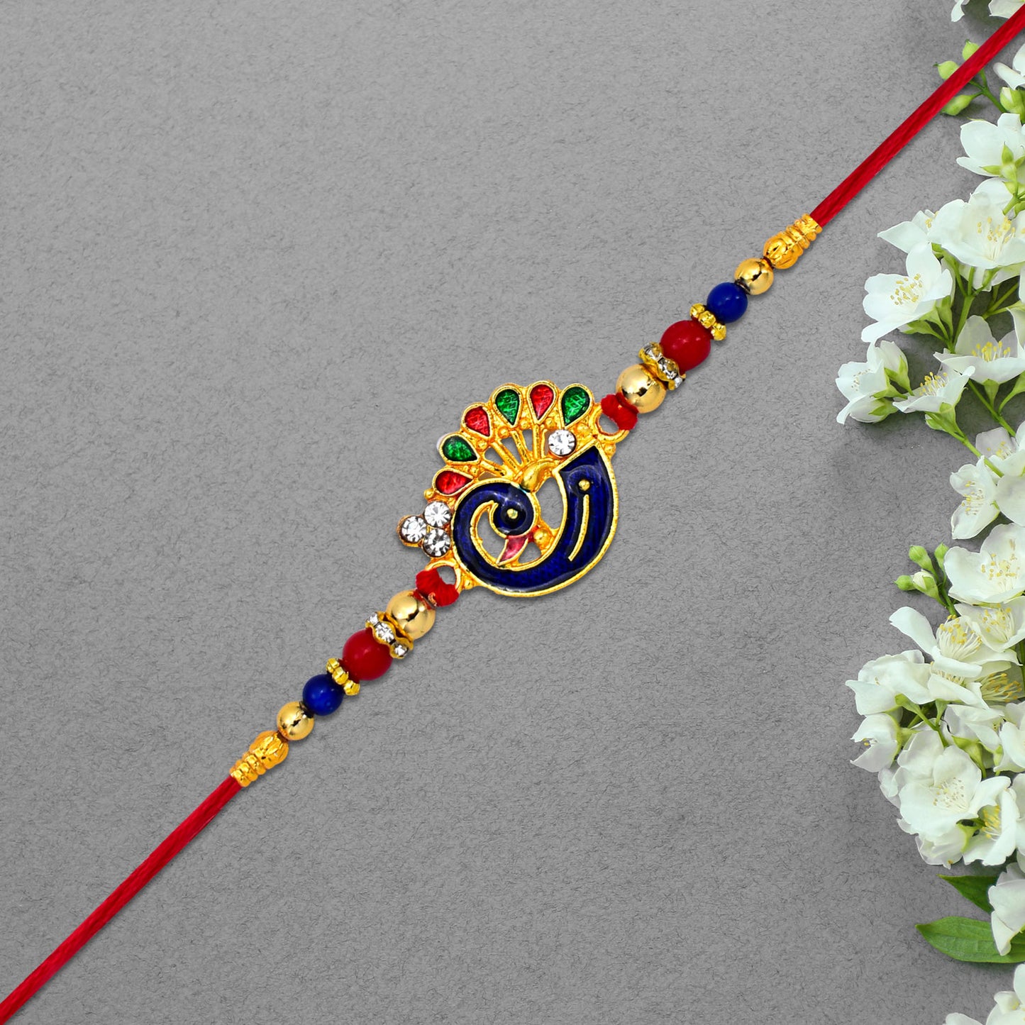 Peacock-themed Designer Rakhi With Colorful Beads Blue Red Gold Finish