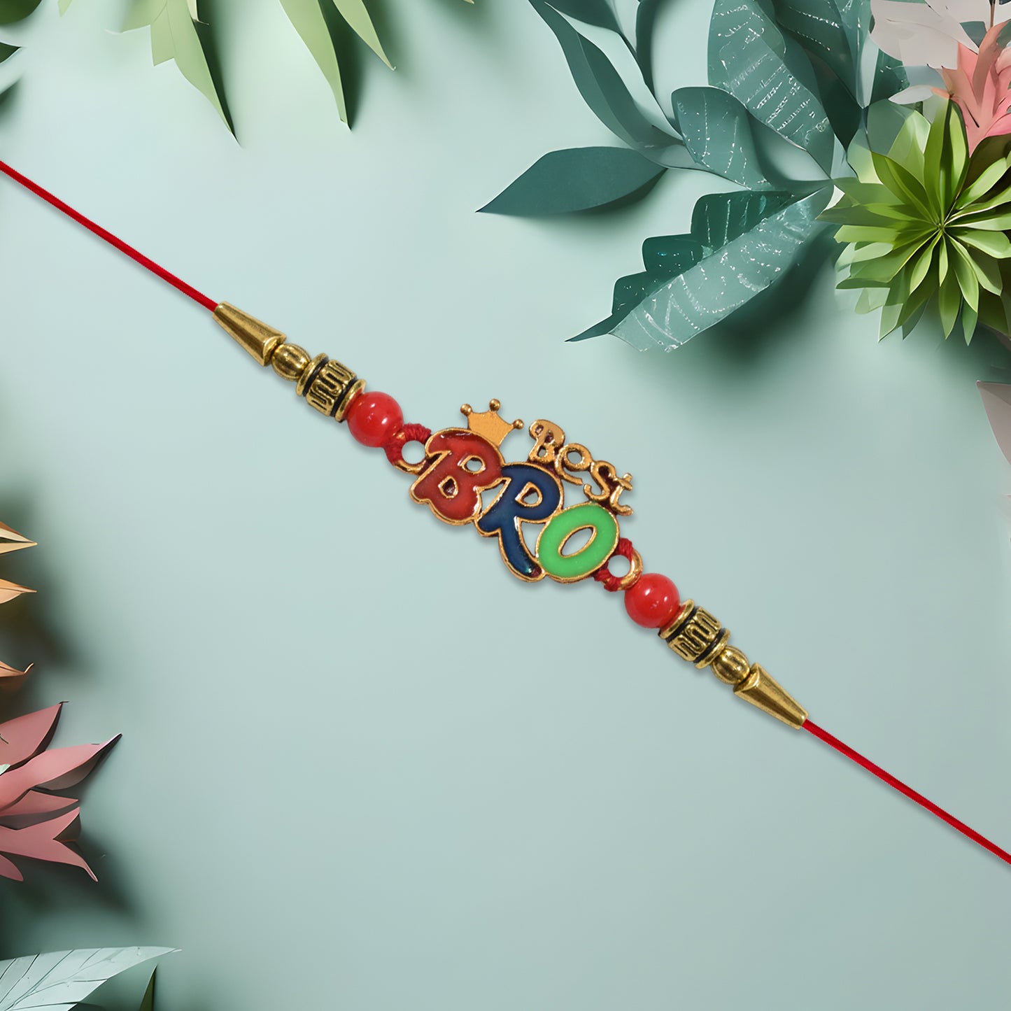 Colorful Best Bro Rakhi With Crown Motif And Decorative Beads On Red Thread