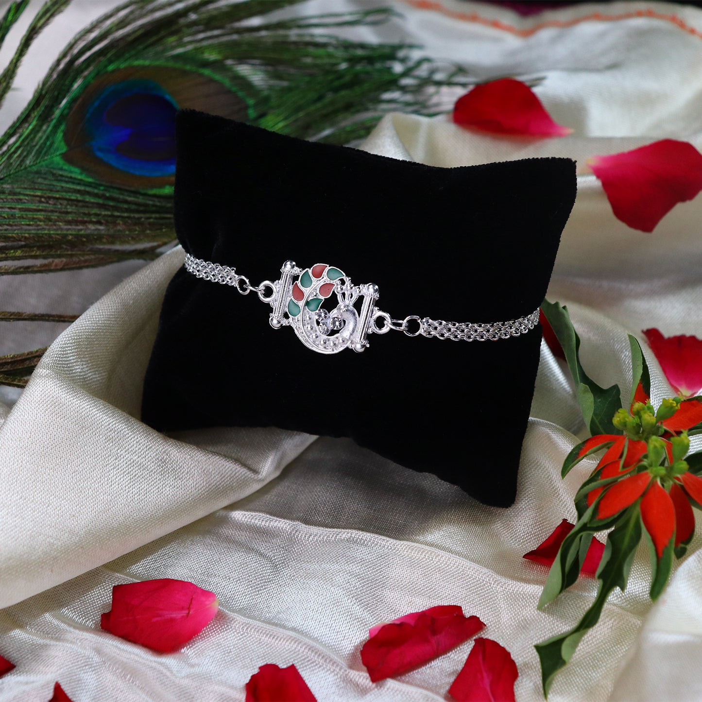 Silver Finish Rakhi With Red-green Enamel