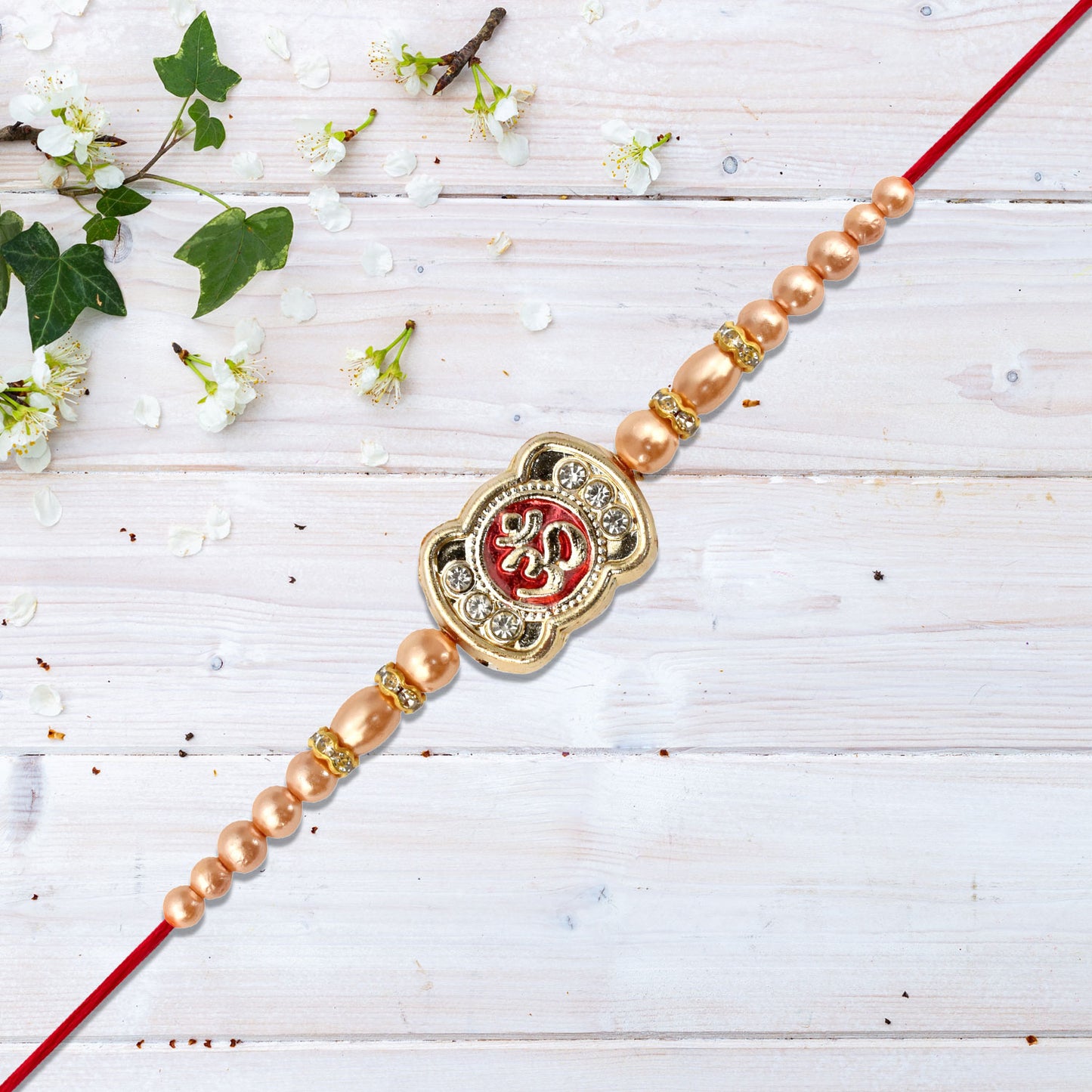 Om Rakhi With Stone Embellishments Golden Beads