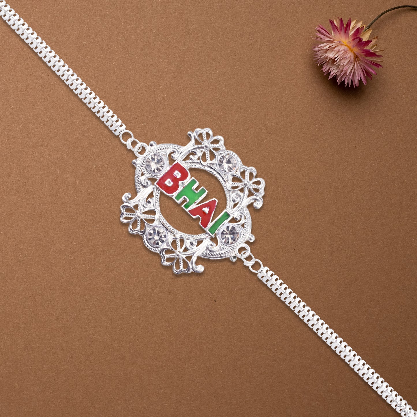 Silver Bhai Rakhi With Floral Frame