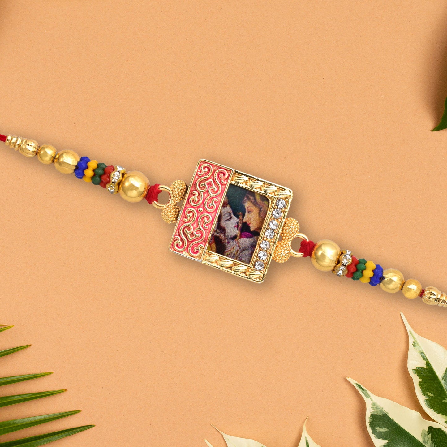 Radha Krishna Rakhi With Ornate Frame  Colorful Beads