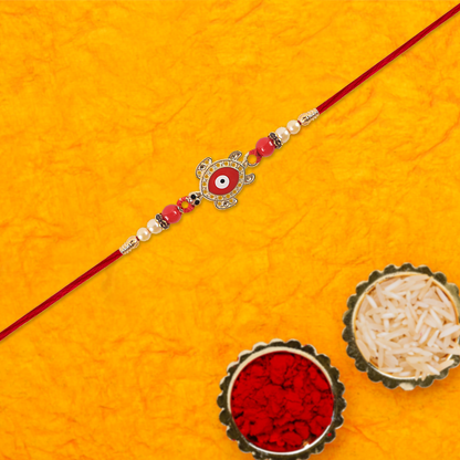 Golden Turtle Design Rakhi With Red Beads  Traditional Mauli Thread