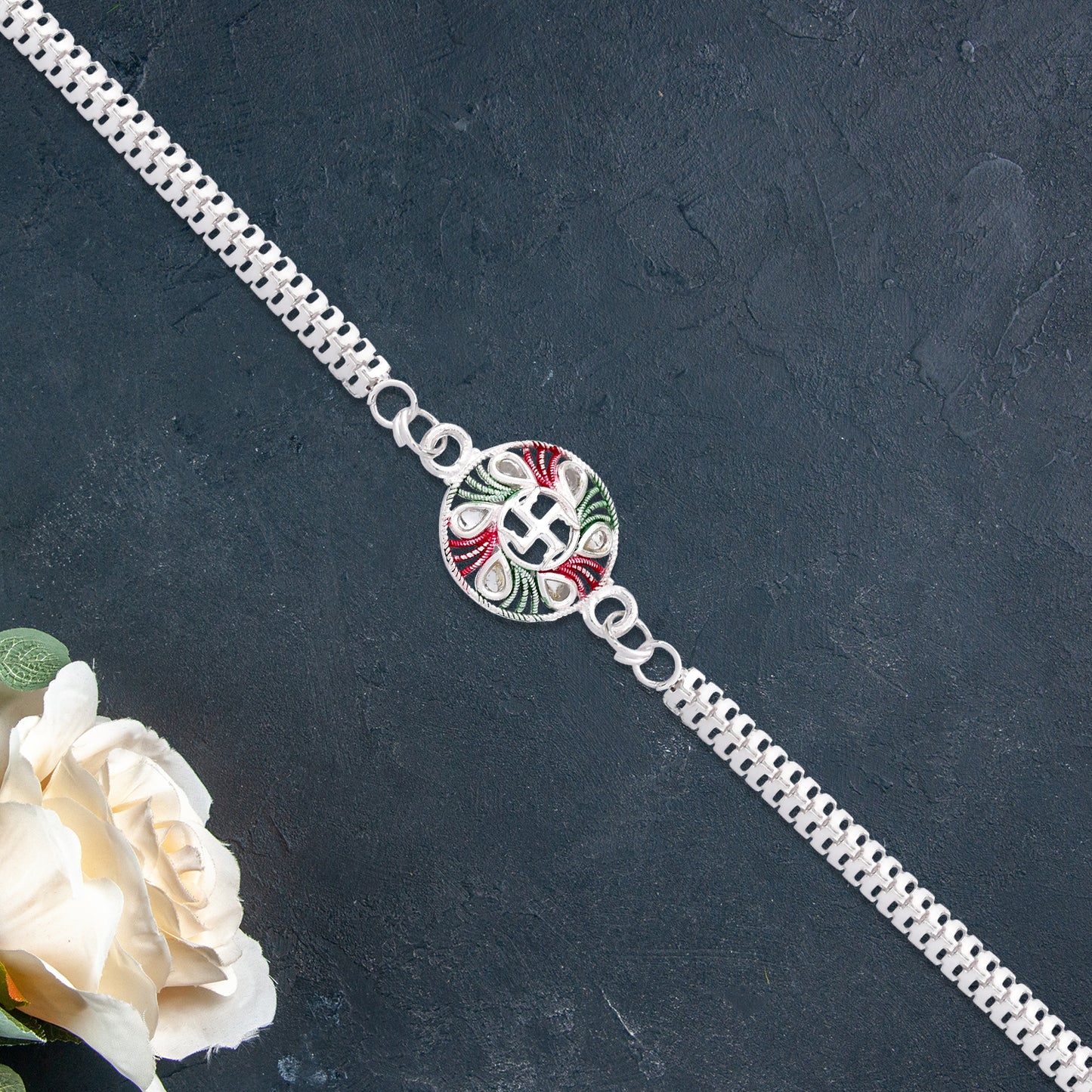 Swastik Design Rakhi With Tricolor Enamel And Silver Metal Chain