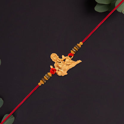 Lord Ganesha Rakhi With Beaded Thread