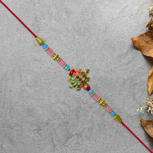 Turtle Design Rakhi With Floral Accents And Beads
