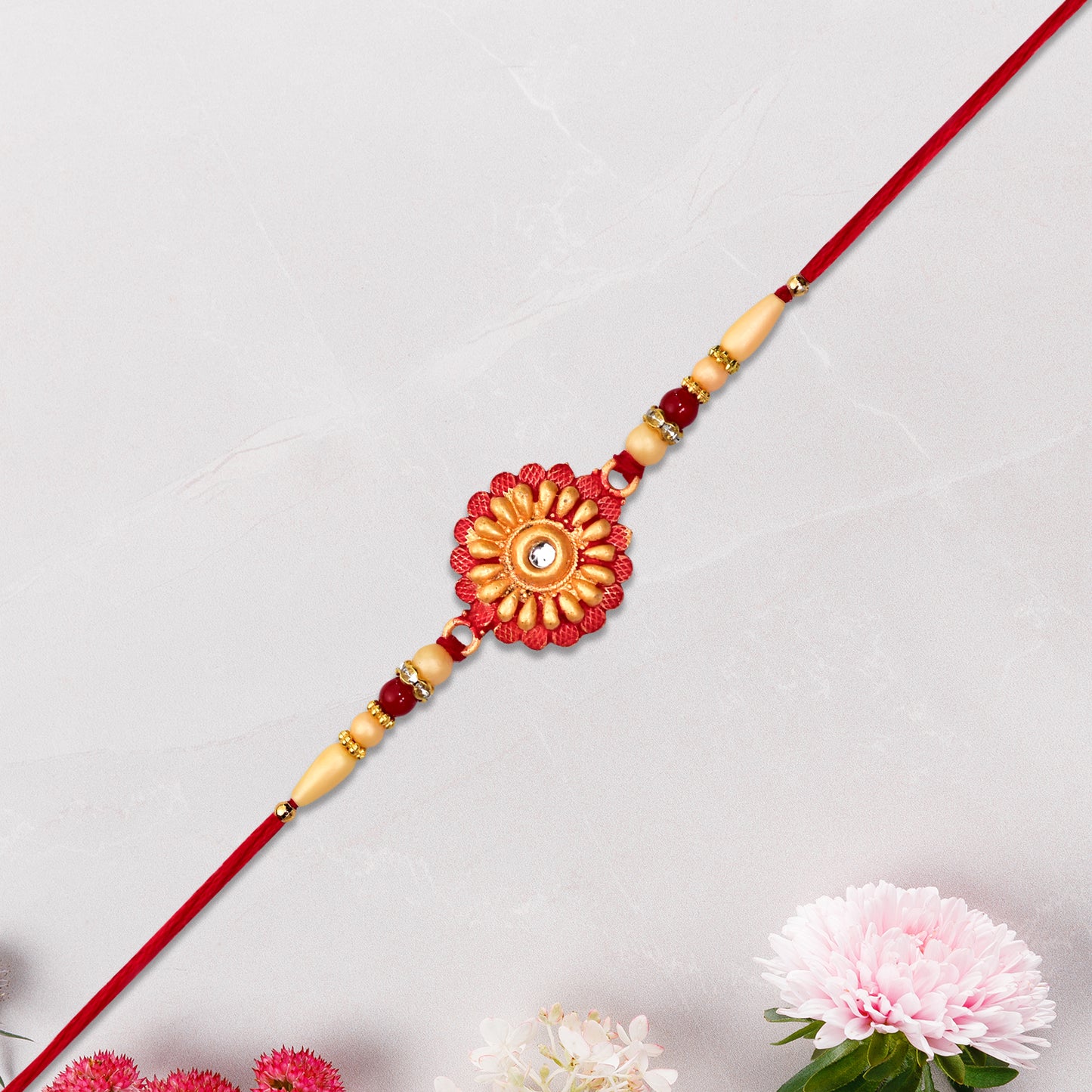 Floral Bead Rakhi With Central Stone