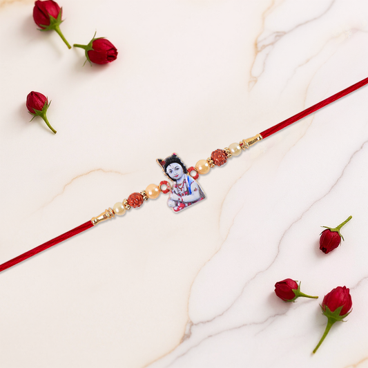 Elegant Krishna Rudraksha Rakhi With Pearls  Red Mauli Thread