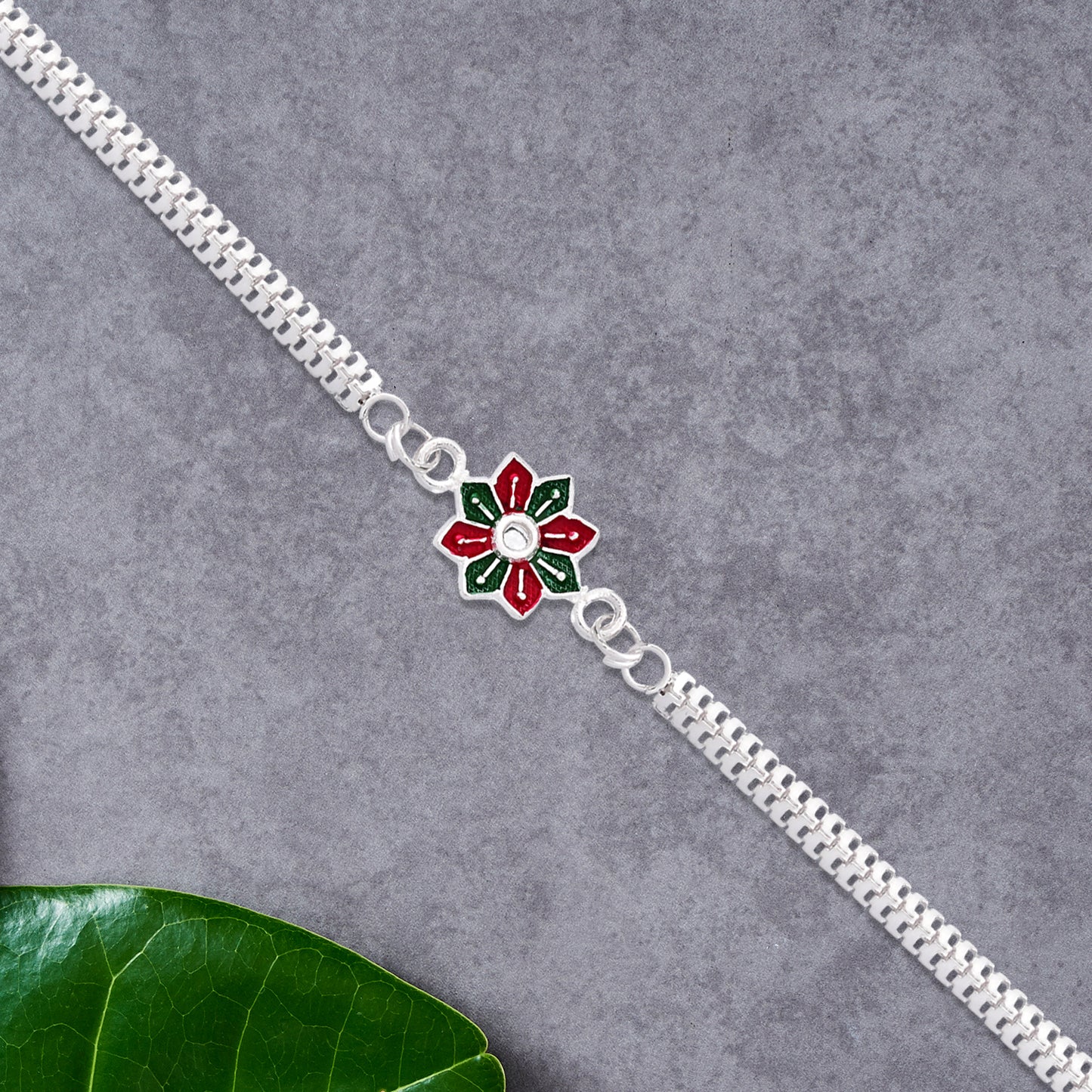 Star Floral Rakhi With Red-green Enamel And Silver Chain