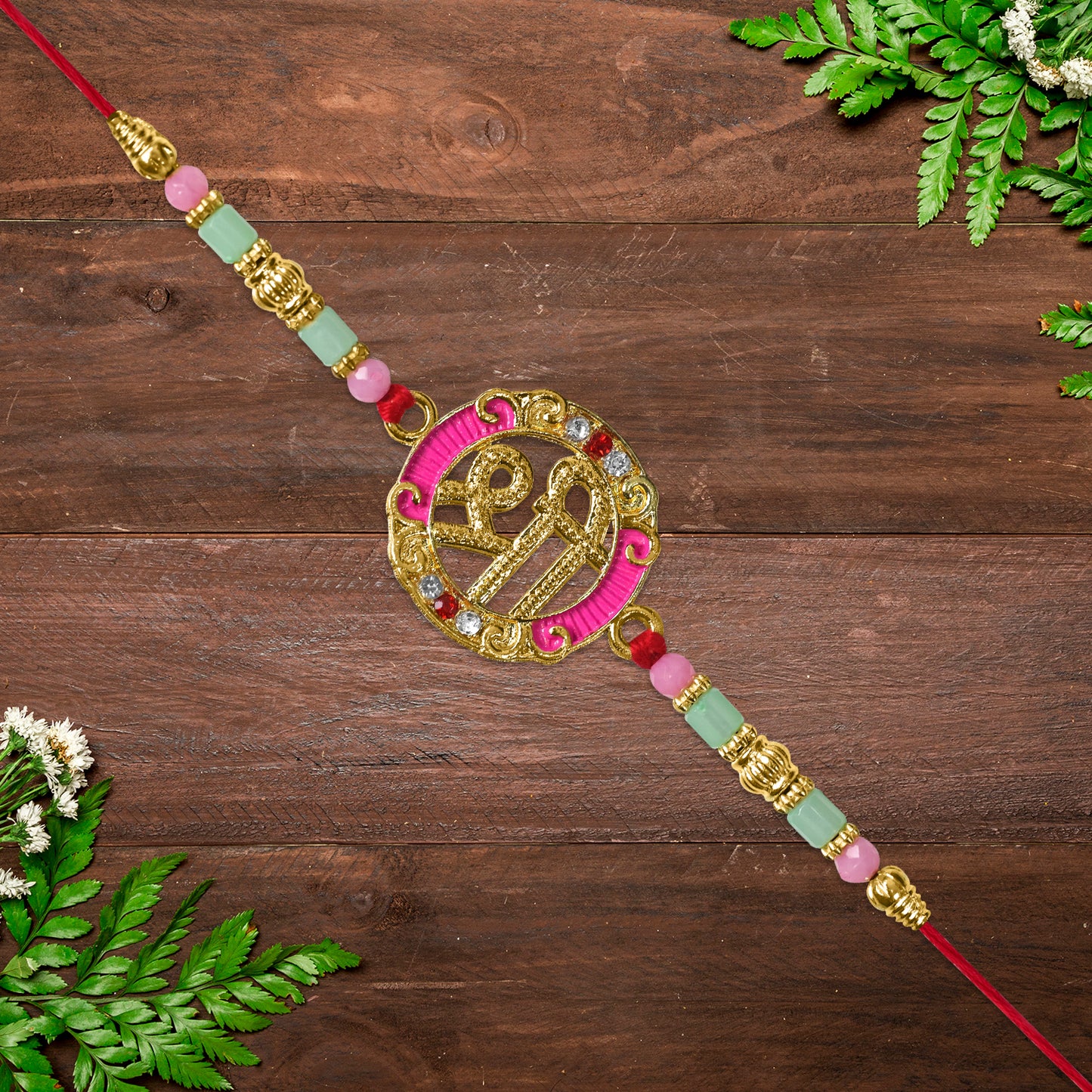 Shree Round Designer Rakhi With Pink Accents