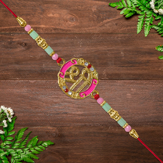 Shree Round Designer Rakhi With Pink Accents