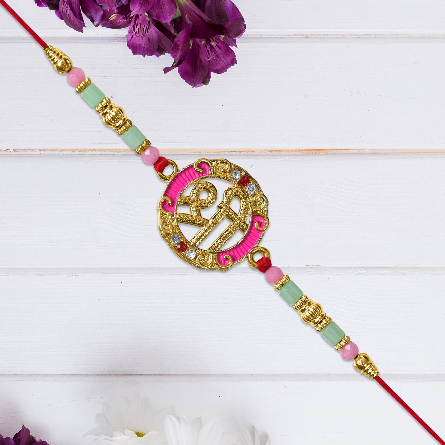 Shree Round Designer Rakhi With Pink Accents
