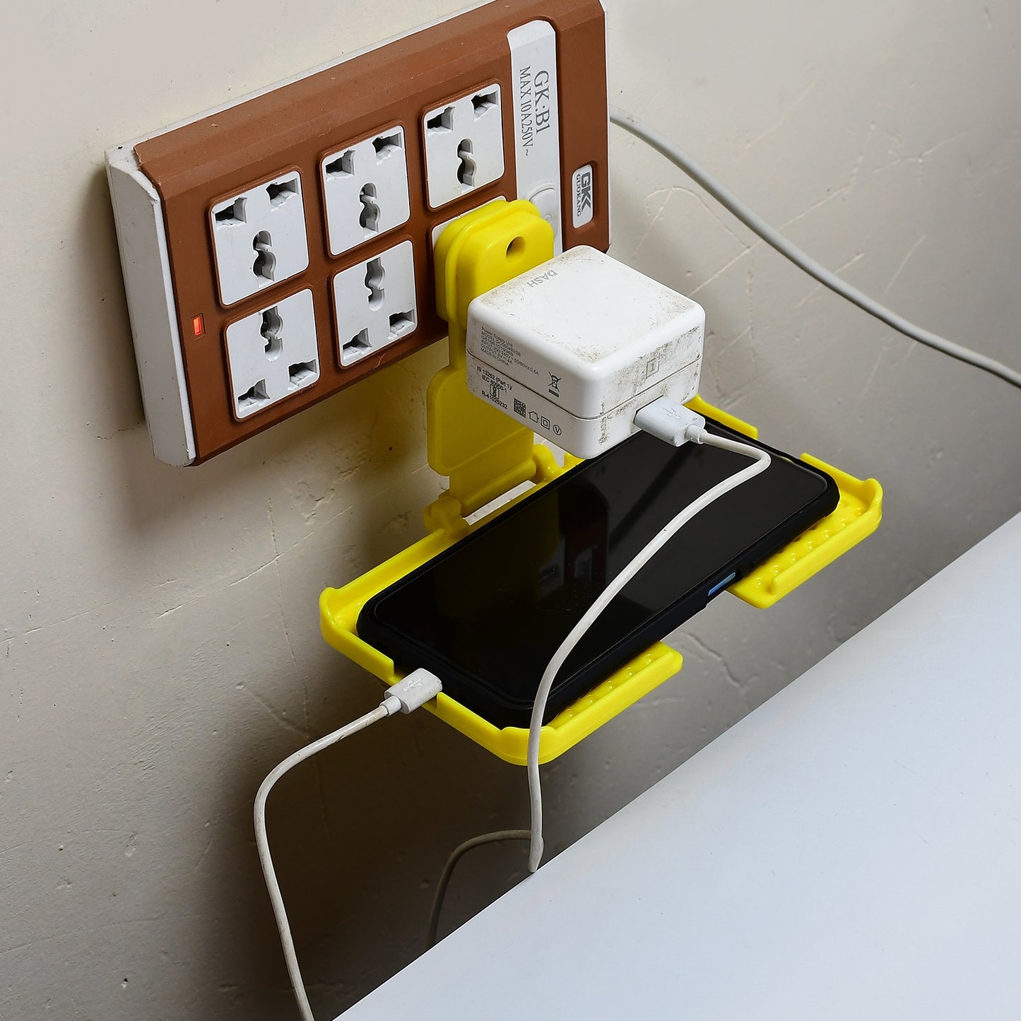 6498 Multi-purpose Wall Holder Stand For Charging Mobile Just Fit In Socket And Hang (Yellow)