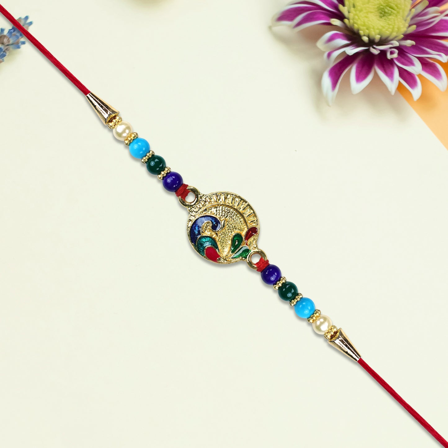 Circular Rakhi With Multicolor Beads And Gold Finish